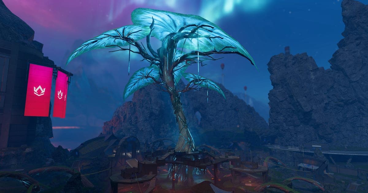 Apex Legendsの実際のゲーム画面 — 暗い空の下、岩壁の間に青緑に光る巨大な植物状の構造物がそびえ、ピンクの旗が掛かっている地形