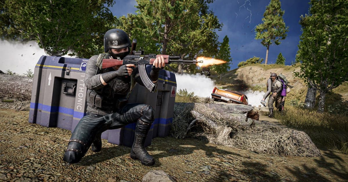 Actual PUBG: BATTLEGROUNDS gameplay — a helmeted player kneeling behind a supply crate and firing a rifle in a forest firefight