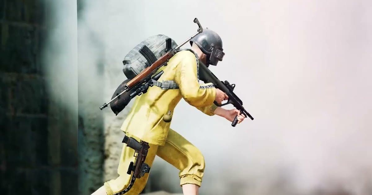 A PUBG: BATTLEGROUNDS character in yellow with a helmet and backpack, gun raised, edging out from behind a wall into thick smoke