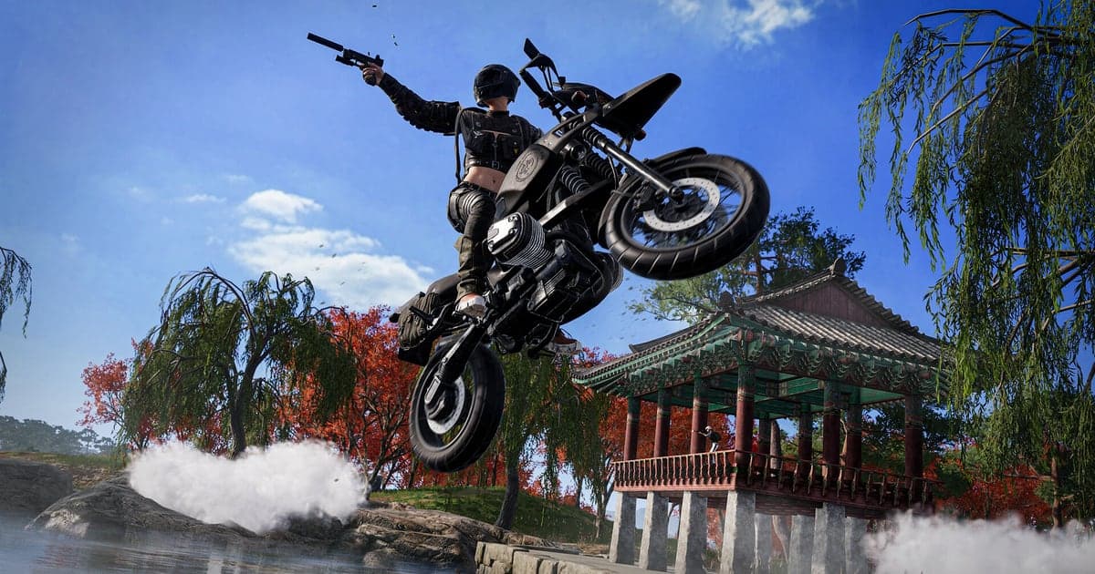 Actual PUBG gameplay — firing a pistol mid-air during a motorcycle jump