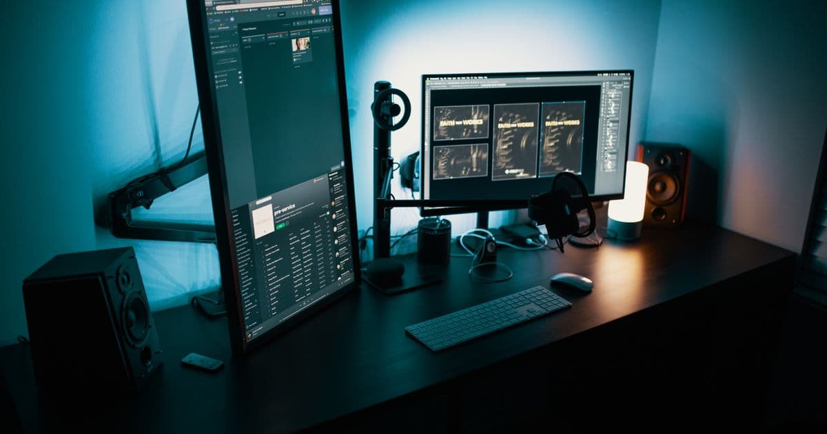 A black computer monitor on a desk