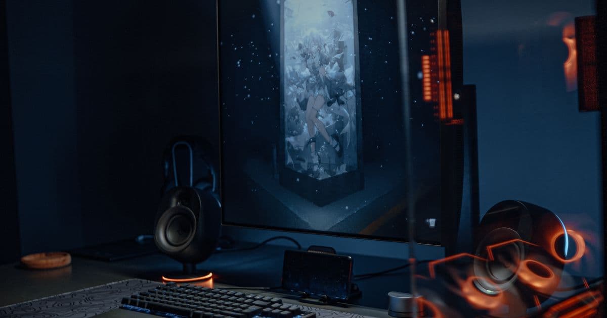 Gaming desk and PC with blue and orange lighting